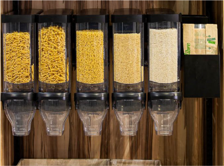 Gravity dispenser for nuts in a supermarket